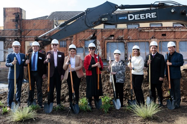The groundbreaking for the Joan and Irwin Jacobs Performing Arts Center at Liberty Station on Jan. 23, 2024, drew (from left) Cygnet Theatre co-founders Sean Murray and Bill Schmidt, donor Irwin Jacobs, U.S. Rep. Sara Jacobs, Kathleen Krentler, Barbara Bolt, NTC Foundation President and Chief Executive Lisa Johnson, San Diego Mayor Todd Gloria and builder Scott McMillin. (Cygnet Theatre)