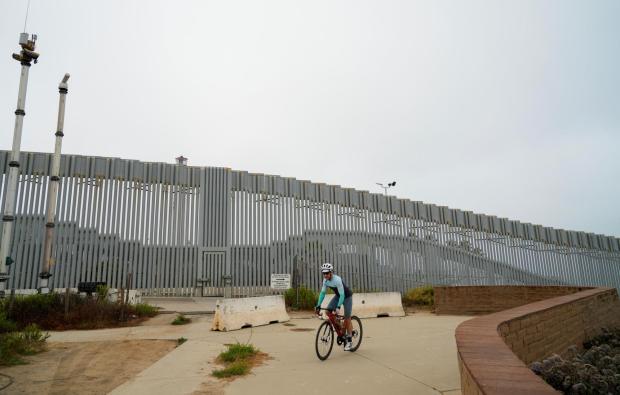 A bicyclist in the Monument Mesa park area in Border Field State Park on Sunday. (Alejandro Tamayo / The San Diego Union-Tribune)
