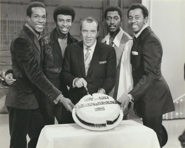 Ed Sullivan, center, with members of the Temptations vocal group. Sullivan's support of Black artists is the focus of the new Netflix documentary "The Untold Story of Ed Sullivan. (Netflix)