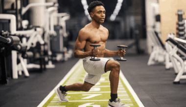 A man doing a lunge with two light dumbbells