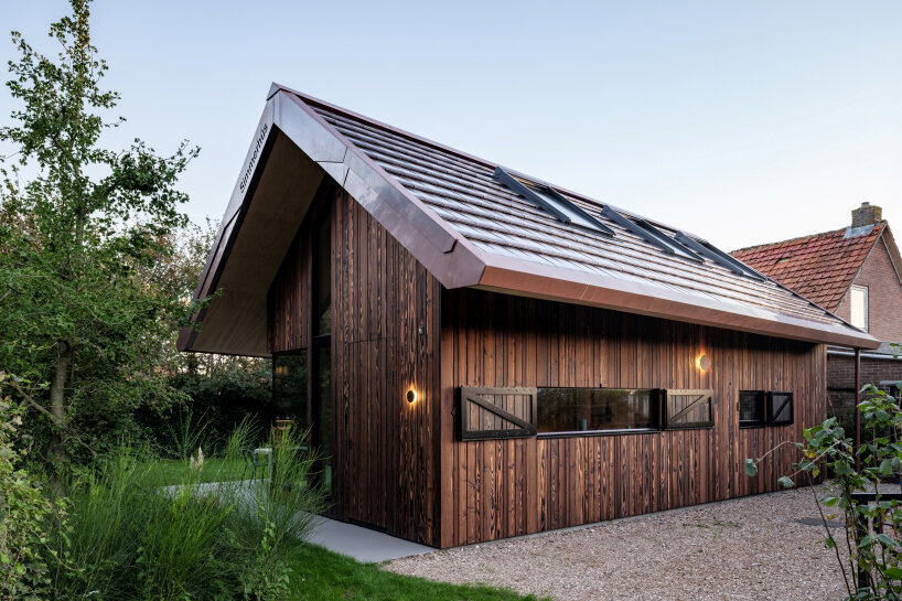 asymmetric roof tops prefabricated holiday home by team v architecture on dutch island