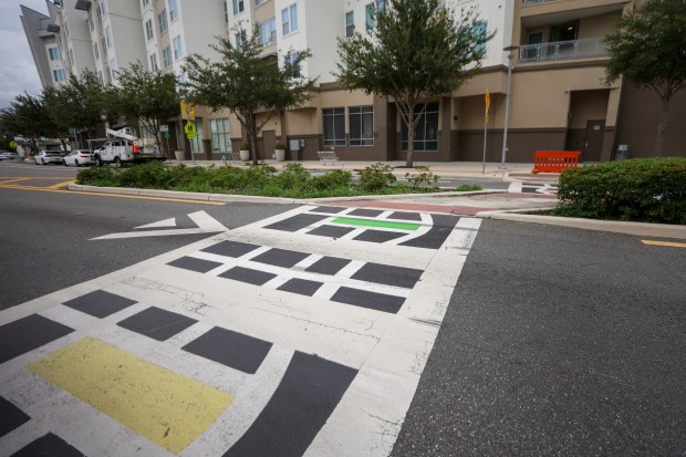 The painted crosswalk at Amelia St. and Chatham Ave in...