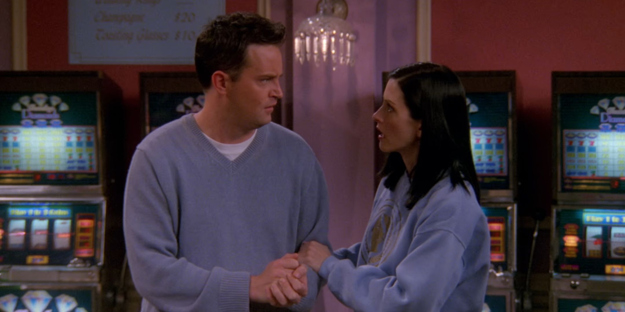 Matthew Perry as Chandler on Friends with Courteney Cox as Monica