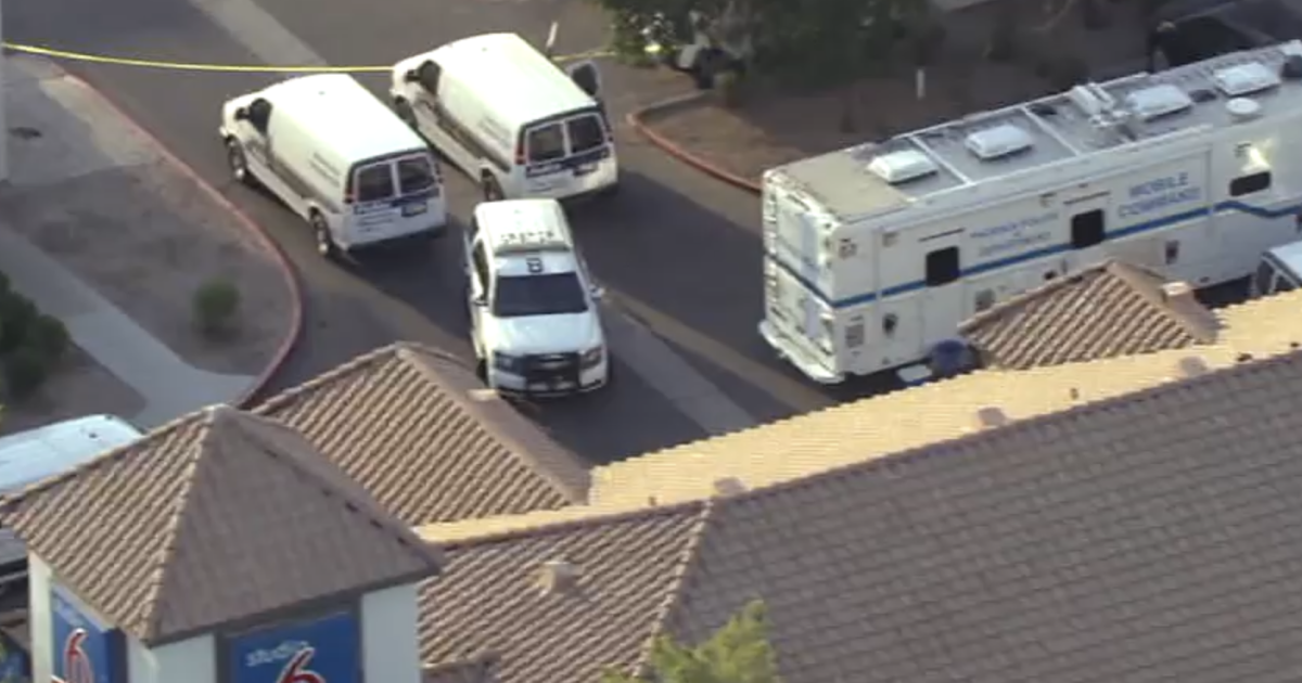 Teen killed, mother arrested in accidental shooting at Phoenix motel