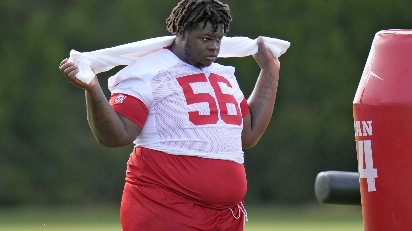 Desmond Watson, the heaviest player in NFL history, was released by Tampa Bay