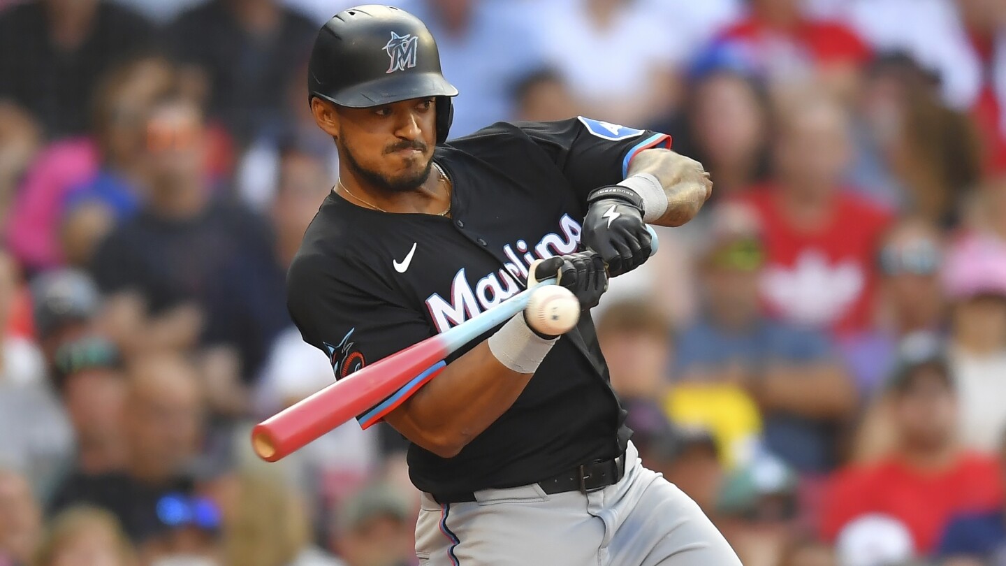Fenway Park fan removed for heckling Marlins' Dane Myers, who hits tying homer
