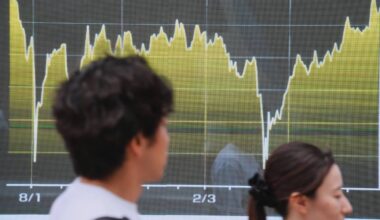 Asian markets are mixed after Wall St tumbles following poor US jobs report