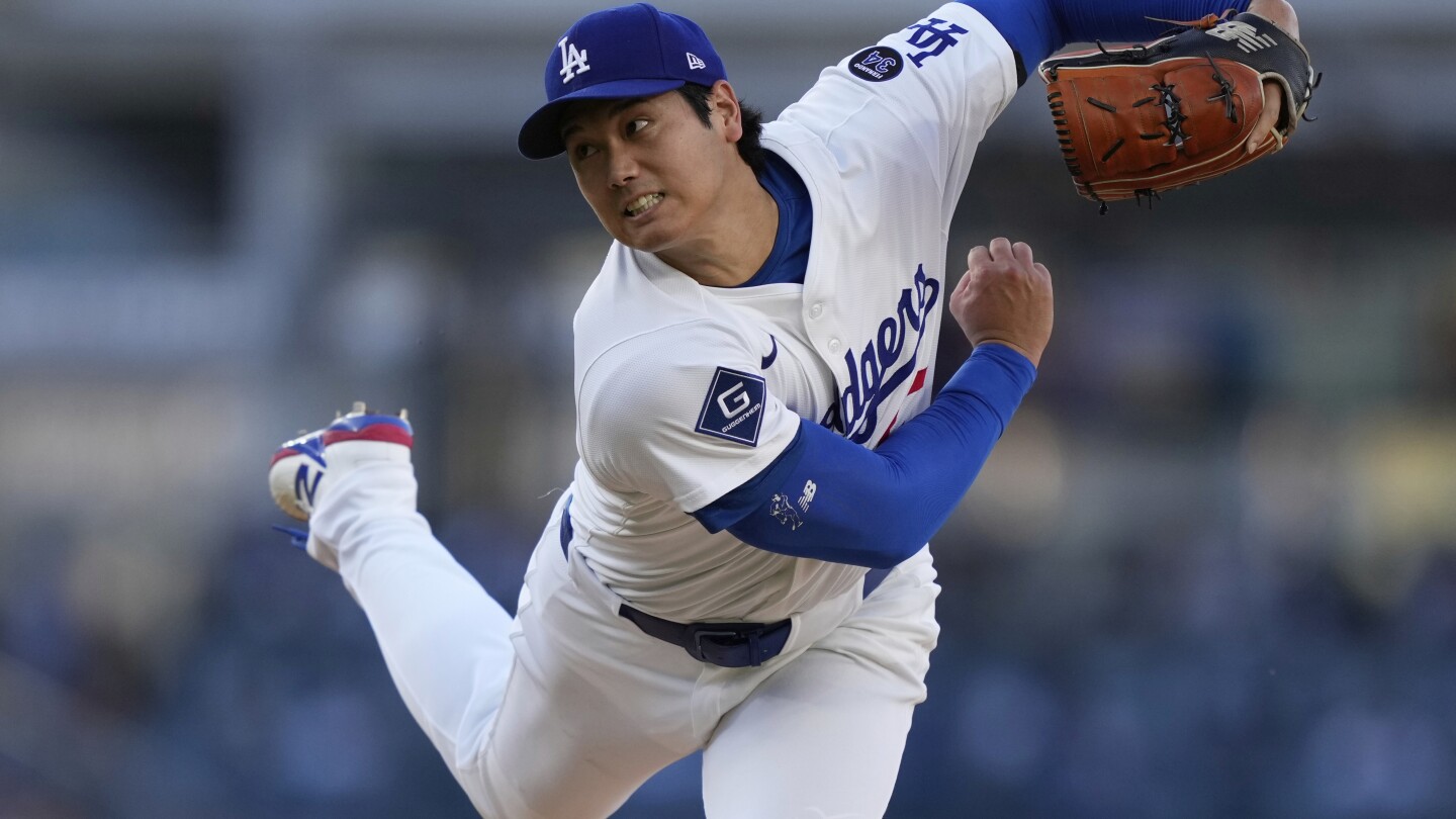 Shohei Ohtani gets first victory with Dodgers, striking out season-high 9 against Reds