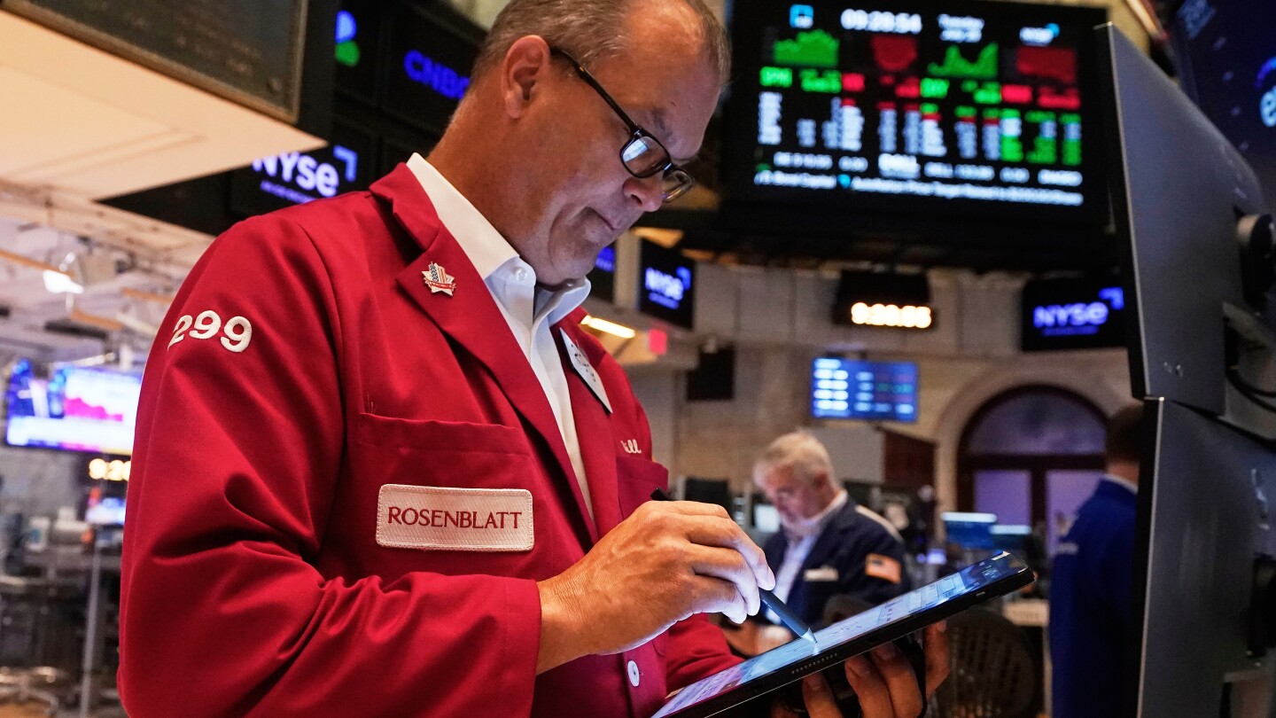 Wall Street climbs toward records as hopes solidify for the Fed to cut rates