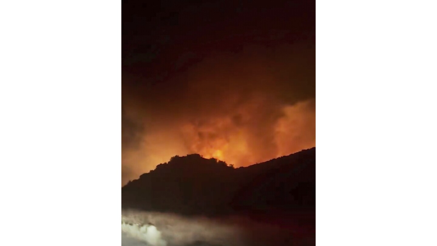 Firefighters battle fast-moving blaze near Los Angeles