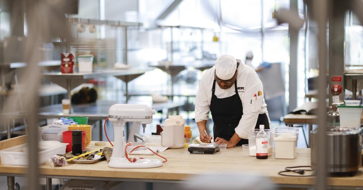 Undeterred by tough restaurant times, students are lining up for this college culinary program