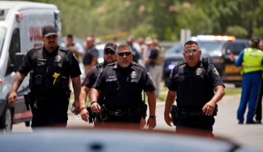 Police walk near Robb Elementary School following a shooting, Tuesday, May 24, 2022, in Uvalde, Texas. (AP Photo/Dario Lopez-Mills)