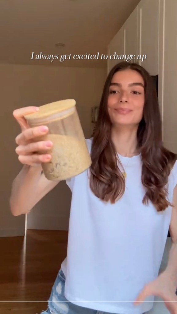 Woman holding a jar of ingredients for boosting immunity.