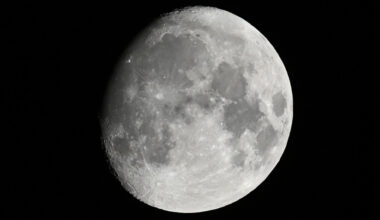 A waxing gibbous moon is pictured with the majority of its surface lit by direct sunlight.