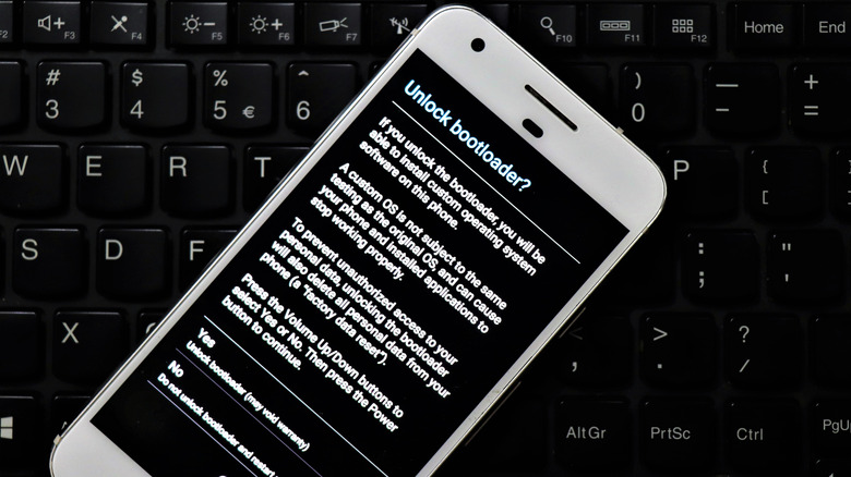 close-up of Android phone with Unlock bootloader showing on screen