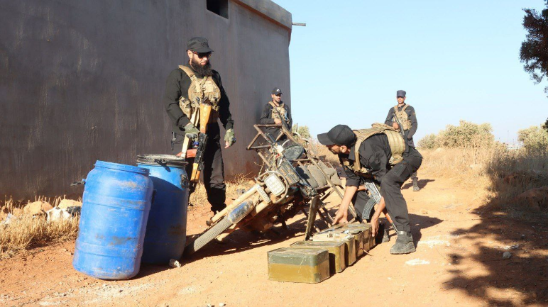 The motorcycle used for smuggling and the weapons (al-Ekhbariya al-Suriya TV, August 24, 2025)