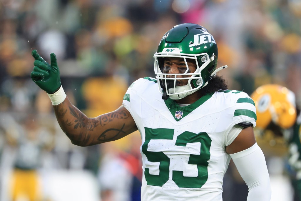 Zaire Barnes #53 of the New York Jets reacts after a play during the first quarter against the Green Bay Packers during the NFL Preseason 2025 game between the New York Jets and the Green Bay Packers at Lambeau Field on August 09, 2025 in Green Bay, Wisconsin. 