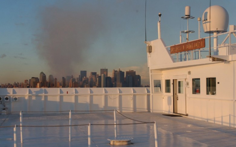 Smoke is seen rising from lower Manhattan in a view from the harbor three days after the 9/11 terrorist attacks in 2001.