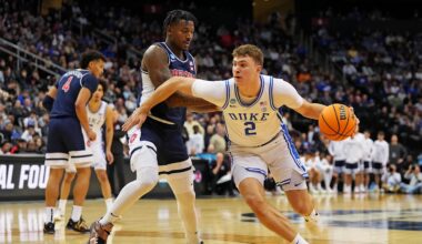 Mar 27, 2025; Newark, NJ, USA; Duke Blue Devils forward Cooper Flagg (2) drives to the basket against Arizona Wildcats guard Jaden Bradley (0) during the second half during an East Regional semifinal of the 2025 NCAA tournament at Prudential Center. Mandatory Credit: Robert Deutsch-Imagn Images