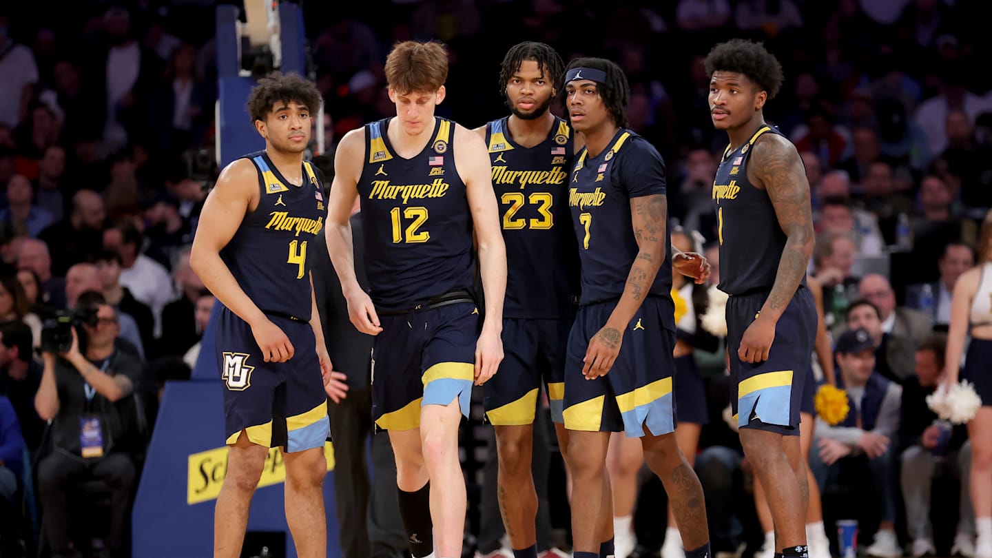 Mar 14, 2025; New York, NY, USA; Marquette Golden Eagles guard Stevie Mitchell (4) and forwards Ben Gold (12) and David Joplin (23) and guards Zaide Lowery (7) and Kam Jones (1) walk onto the court after a time out during the second half against the St. John's Red Storm at Madison Square Garden. Mandatory Credit: Brad Penner-Imagn Images