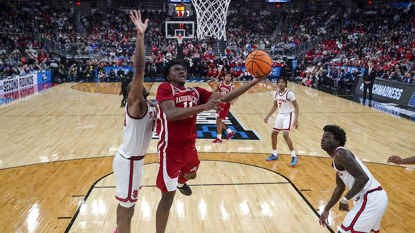 Mar 22, 2025; Providence, RI, USA; Arkansas Razorbacks forward Karter Knox (11) shoots against St. John's Red Storm forward Zuby Ejiofor (24) during the second half at Amica Mutual Pavilion. Mandatory Credit: Gregory Fisher-Imagn Images