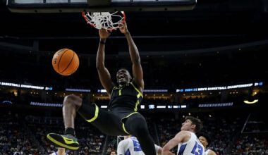 Mar 23, 2024; Pittsburgh, PA, USA; Oregon Ducks center N'Faly Dante (1) dunks the ball against Creighton Bluejays guard Baylor Scheierman (55) in the second round of the 2024 NCAA Tournament at PPG Paints Arena. Mandatory Credit: Charles LeClaire-Imagn Images