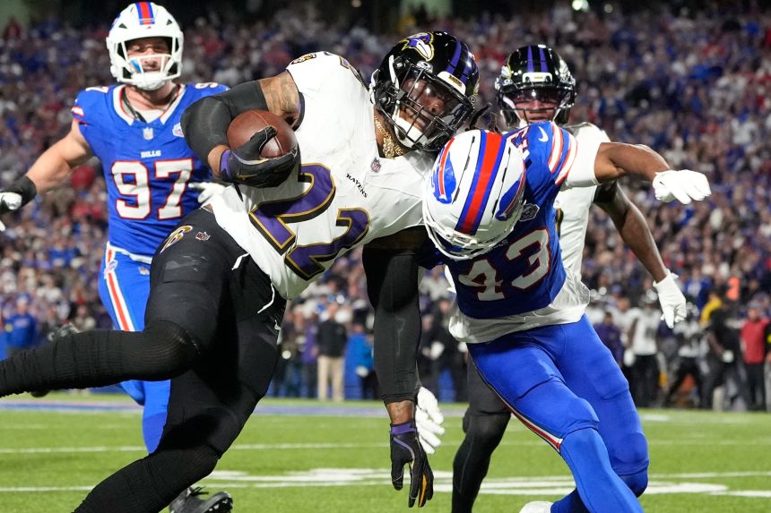 Henry (No. 22) had two touchdowns in the defeat to the Bills.