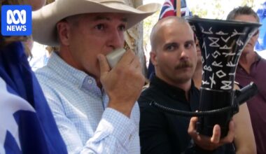 KAP leader says he was unaware man next to him at rally was wearing  neo-Nazi insignia