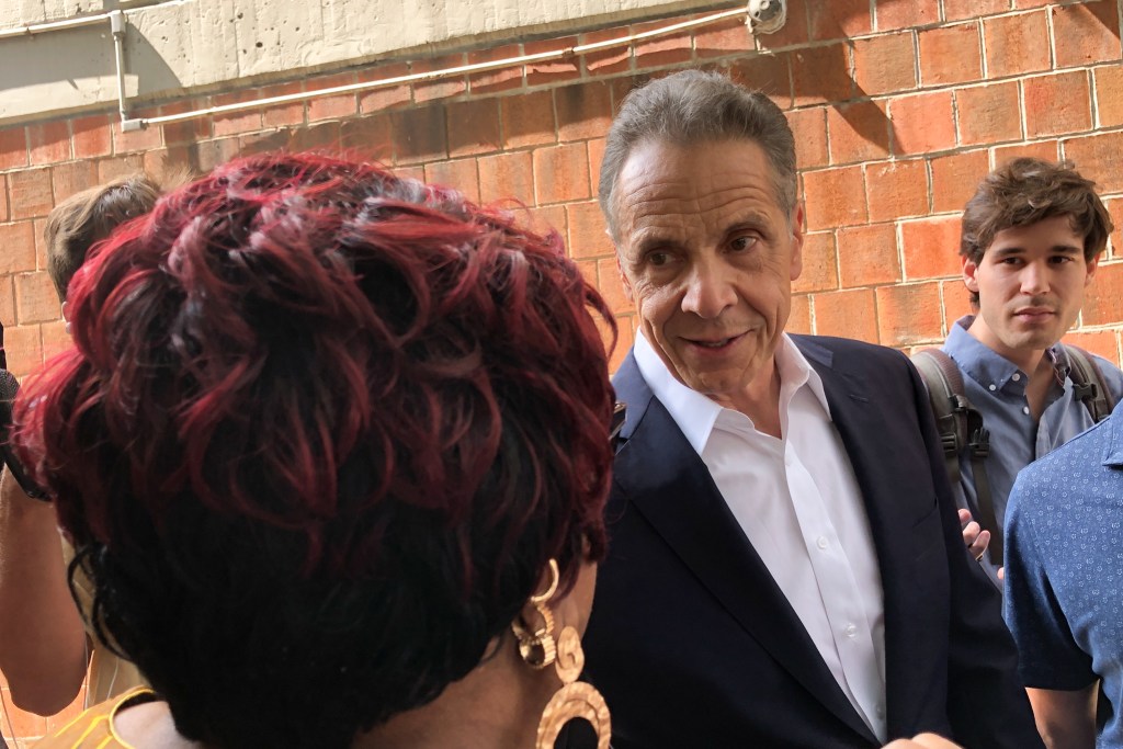 Mayoral candidate Andrew Cuomo speaks with voters outside the Lincoln Center older adult center on the Upper East Side