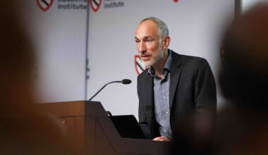 David Reich at lectern.