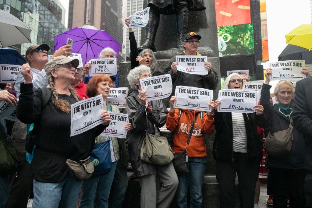 Anti-Times Square casino advocates celebrate a community advisory committee voting down the proposal,