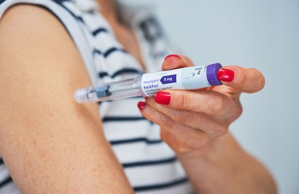 A woman injects himself with a Mounjaro pen on May 30 2025 in London, England. Mounjaro is a treatment for weight loss and type 2 diabetes.