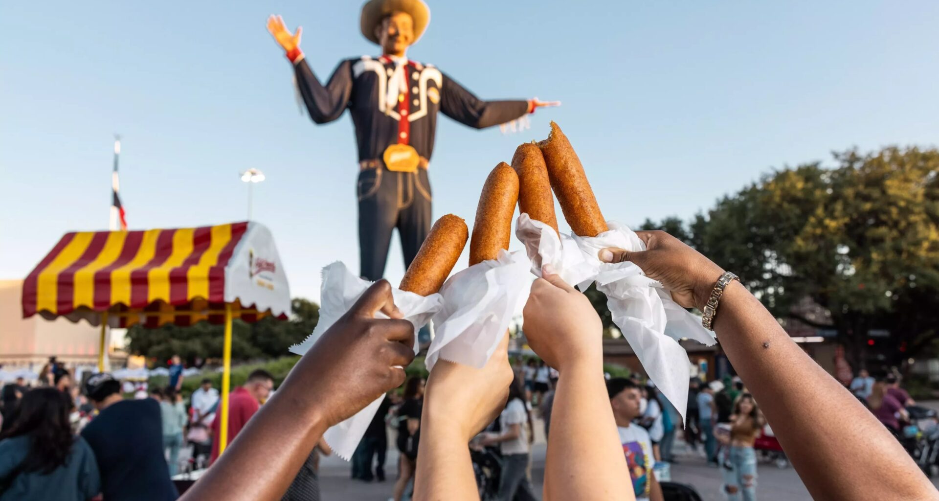 big tex at the state fair of texas with corn dogs