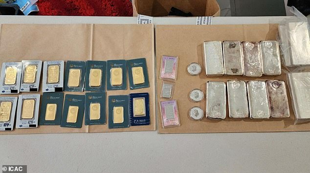 The ICAC haul included gold bars, platinum and silver bullion, bundles of cash, cryptocurrency and computers and other devices when they knocked down the door of the Helmys' Merylands home