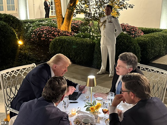 Donald Trump chats with his esteemed guests at the event