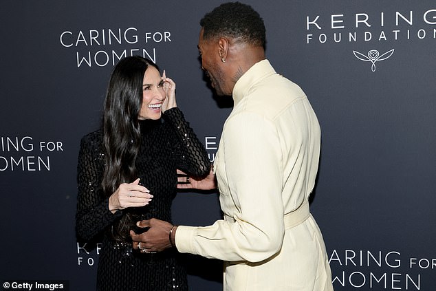 The duo shared a sweet moment in front of cameras