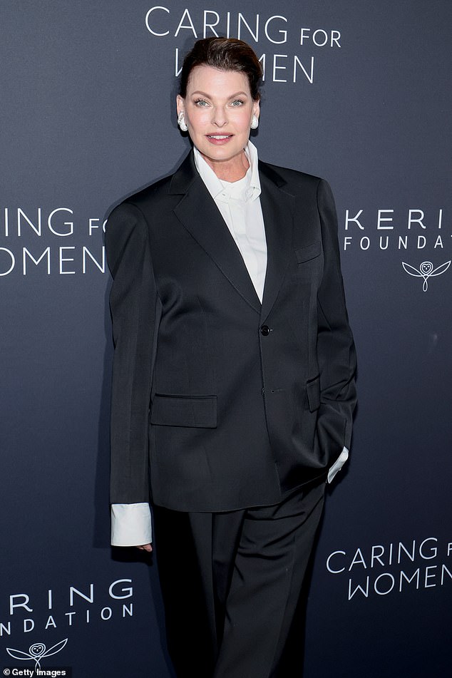 Linda Evangelista was another celebrity guest at the event and showed off her chic style in a pair of loose-fitting black trousers as well as a black blazer