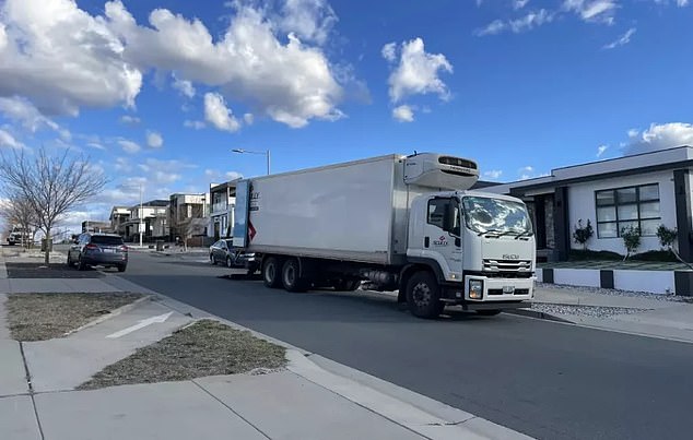 A truck is pictured delivering supplies to the store