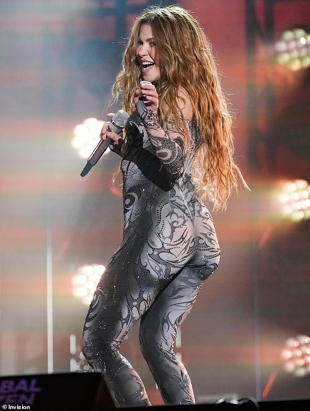 The Hips Don't Lie songstress flaunted her shapely derriere to the audience while prancing around the stage in her skintight costume