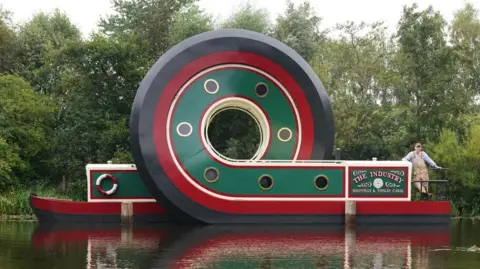 Owen Humphreys/PA The looping canal boat on the Sheffield and Tinsley Canal