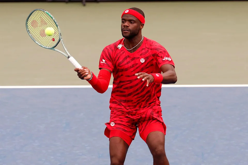 Aug 27, 2025; Flushing, NY, USA; Frances Tiafoe (USA) hits a volley against Martin Damm (USA) (not pictured) on day four of the 2025 US Open tennis tournament at Billie Jean King USTA National Tennis Center. Mandatory Credit: Geoff Burke-Imagn Images