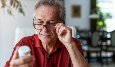 Man taking painkiller.