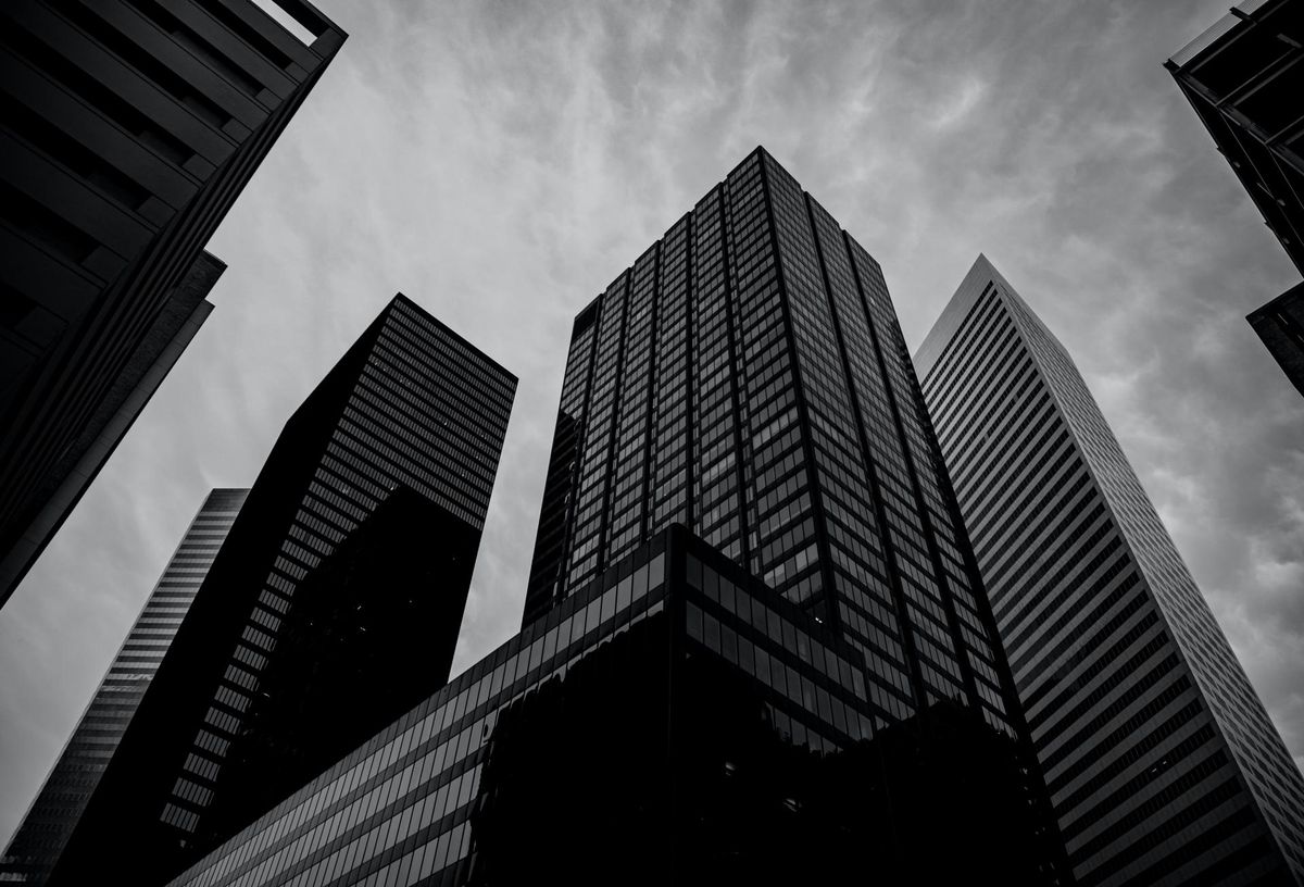 Houston REIT Defaults On Loans, Delays Shareholder Meeting Amid Proxy Contest