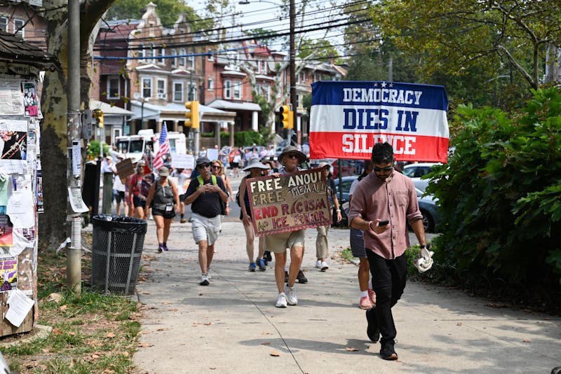 Hundreds march through Penn's campus in anti-Trump protest headed to Washington