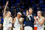 Dallas Wings guard Paige Bueckers (5), guard Aziaha James (10), center Li Yueru and guard...