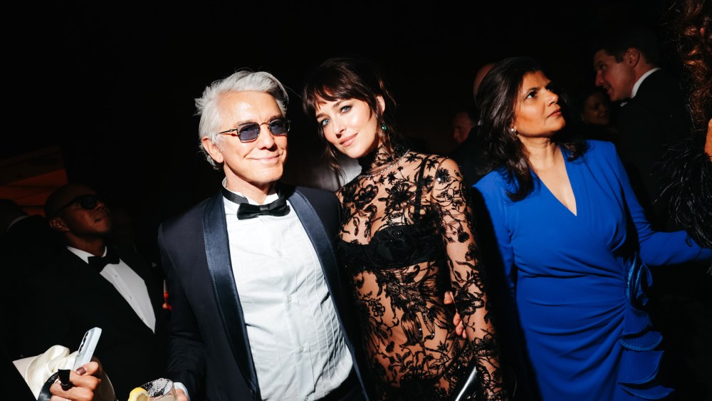 Baz Luhrmann and Dakota Johnson