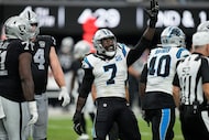 Carolina Panthers linebacker Jadeveon Clowney celebrates after sacking Las Vegas Raiders...