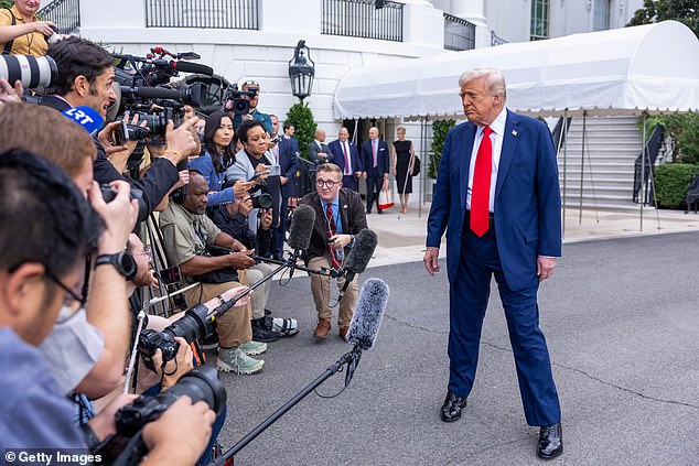 WASHINGTON, DC - SEPTEMBER 21:  U.S. President Donald Trump talks to the media before boarding Marine One on the South Lawn of the White House on September 21, 2025 in Washington, DC. President Trump will travel to Arizona to pay tribute to conservative activist Charlie Kirk at a memorial and return to the White House this evening. (Photo by Tasos Katopodis/Getty Images) *** BESTPIX ***