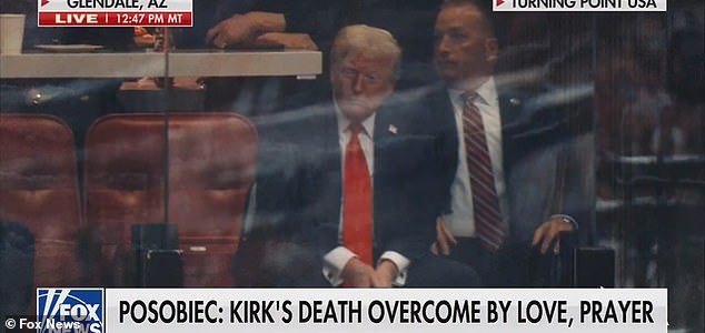 Donald Trump attends the memorial for Charlie Kirk at State Farm Stadium in Glendale AZ