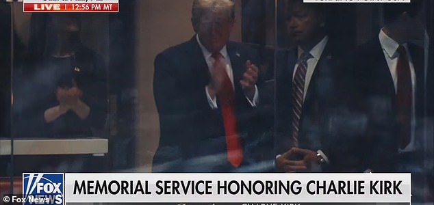 Donald Trump attends the memorial for Charlie Kirk at State Farm Stadium in Glendale AZ